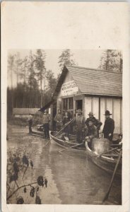 Stewart BC Flooding Men Boats Portland Canada Mercantile Co. RPPC Postcard G8