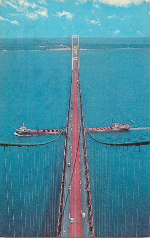 Sailing & navigation themed postcard Mackinac suspension bridge cargo ship
