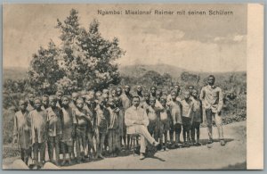 CAMEROON NGAMBE MISSIONER w/ NATIVES ANTIQUE POSTCARD