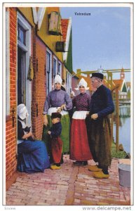 VOLENDAM, North Holland, Netherlands; Man, Women and Boy wearing traditional ...