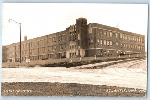 Atlantic Iowa IA Postcard RPPC Photo High School Building Dirt Road 1940 Vintage