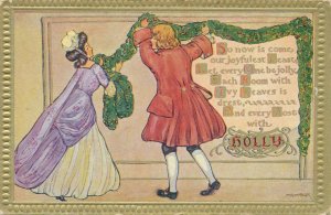 Christmas Greetings - Woman and Man Hanging Holly - a/s Marion Miller - DB