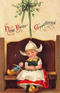 Ellen Clapsaddle Artist New Year Greetings Young Girl Doll Embossed Postcard