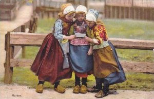 Netherlands Marken Young Girls Reading Letter  In Local Costume