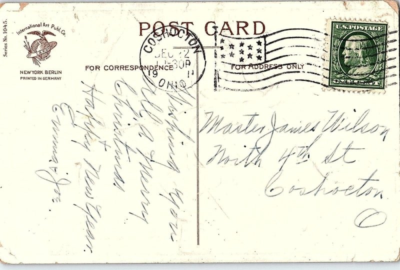 C.1910 Clapsaddle Cute Boy Christmas Presents Snow Postcard P134