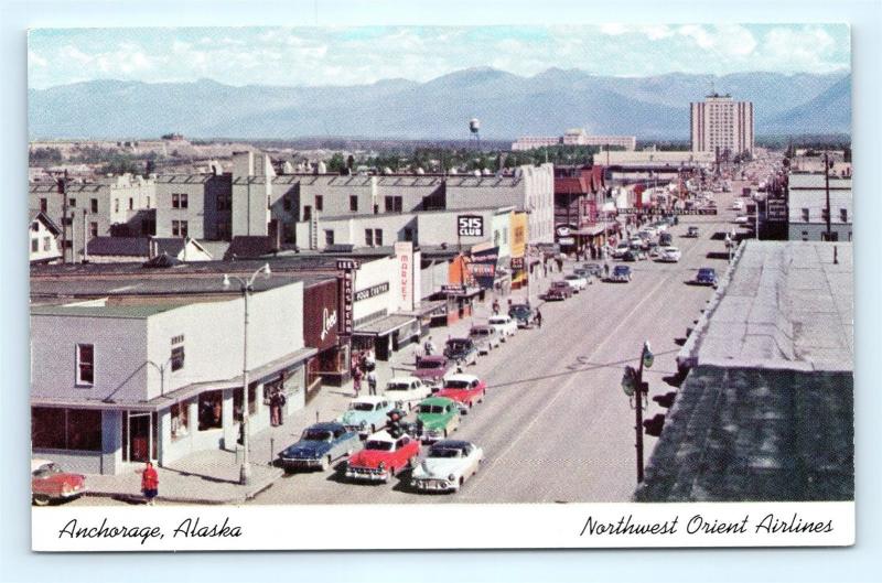 Postcard AK Anchorage 1950's Street View Northwest Orient Airlines Issue R60