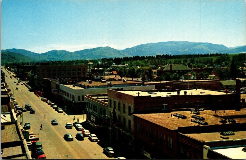 East on Main Street Aerial View Bozeman Montana Postcard old Cars Trucks UNP