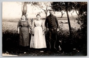 RPPC Two Large Women Gentleman Rifle Pistol and Hunting Dogs Postcard L40