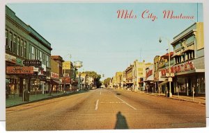 Miles City Montana Street Scene Cleaners, Drug Store, Clothiers Vtg Postcard A19