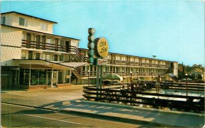 Sea N Sun Motel Virginia Beach Virginia Postcard pool, man jumping diving board