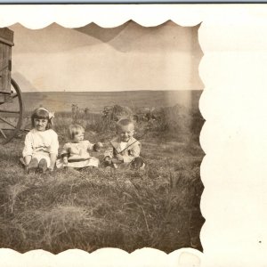 c1910s Cute Children Play Outdoors RPPC Hay Wagon Farm Border Happy Photo A167