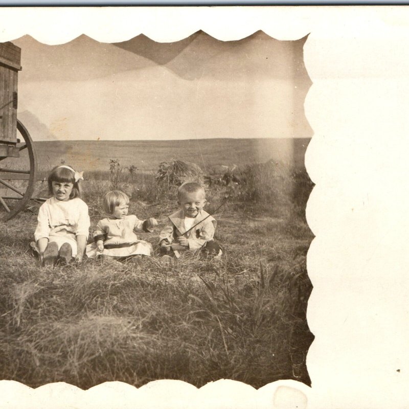 c1910s Cute Children Play Outdoors RPPC Hay Wagon Farm Border Happy Photo A167