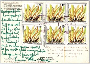 VINTAGE CONTINENTAL SIZED POSTCARD POSTED FROM RWANDA AFRICA WITH FULL STAMPS 