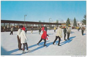 People ice skating at the Grossinger Ice Skating Rink, Grossinger, New York, ...