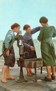 Postcard Dutch Girls Enjoying A Drink Of Freshwater Way Of Life Pennsylvania PA