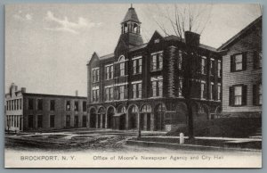 Postcard Brockport NY c1960s? Office of Moore’s Newspaper Agency and City Hall