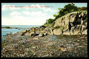 Along the Rocky Shore of Newark Bay. Bayonne, NJ. John C. Voigt, German postcard