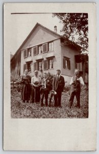 RPPC Family Photo Men with Musical Instruments Women with Books Postcard L44