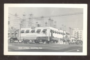 RPPC KILGORE TEXAS DOWNTOWN STREET SCENE OLD CARS VINTAGE REAL PHOTO POSTCARD