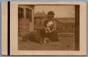 Postcard RPPC c1911 Deerwood MN Lady With Puppies & Dog Brainerd? Lumber Company