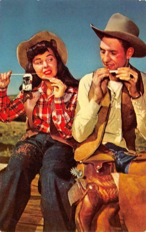 Western RIDE EM & ROLL EM Cowboy & Cowgirl Rolling Cigarettes SMOKING Postcard