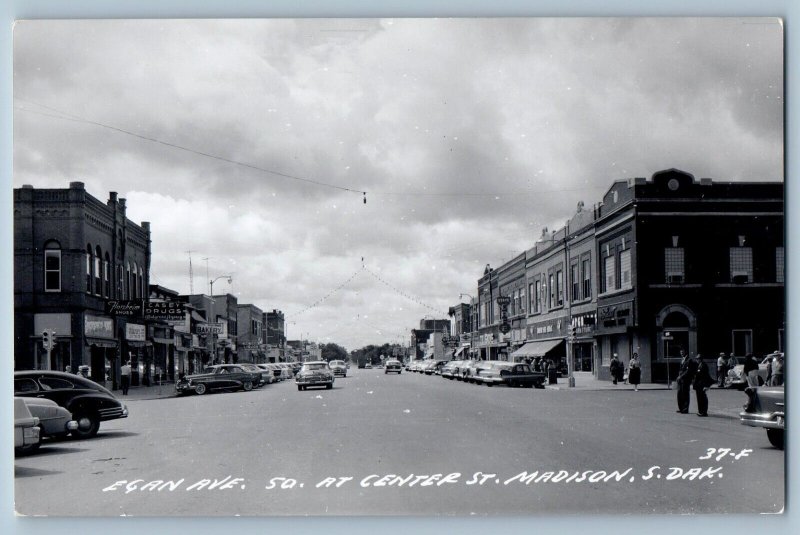 Madison SD Postcard RPPC Photo Egan Ave. So. At Center Street Florsheim Bakery