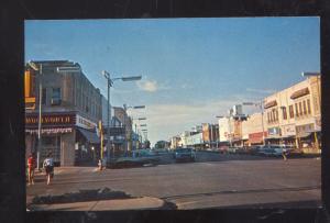 MCPHERSON KANSAS DOWNTOWN STREET SCENE VINTAGE POSTCARD OLD CARS STORES