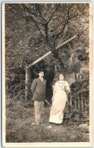 ID'd c1910s Outdoors Couple RPPC Woman w/ Umbrella Summer Real Photo Scott A125