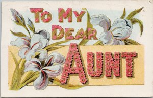 'To My Dear Aunt' Large Letter Aunty Flowers Embossed c1908 Postcard G6