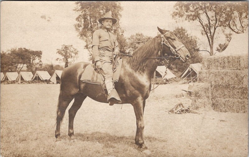 RPPC Handsome Calvary Soldier on Horseback Encampment Real Photo Postcard Y13 