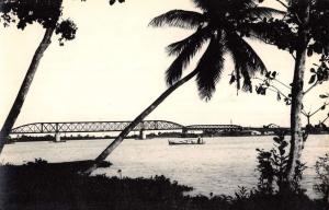 Vietnam ? Waterfront Bridge Real Photo Antique Postcard K60941