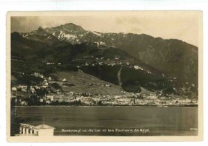 Switzerland - Montreux. Lake Geneva & Rocky Mts. of Naye RPPC (creases)