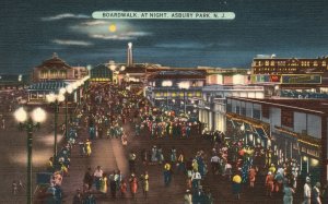 Vintage Postcard Boardwalk At Night Crowded Streets Asbury Park New Jersey NJ