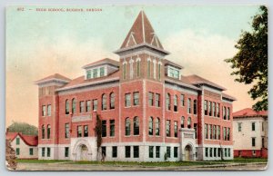 Eugene Oregon~High School~Boy on Bicycle~Houses on Both Sides~1910 Postcard