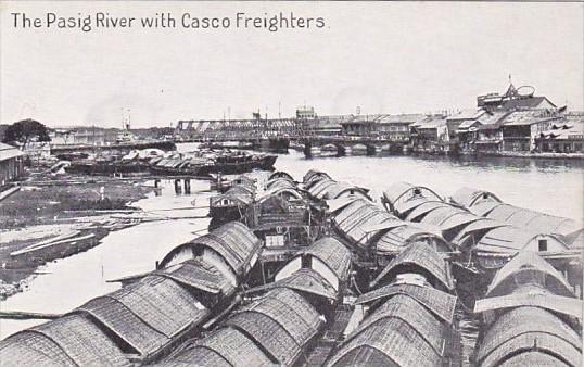 Philippines The Pasig River With Casco Freighters