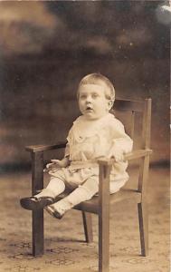 Little child in a chair Child, People Photo Unused 