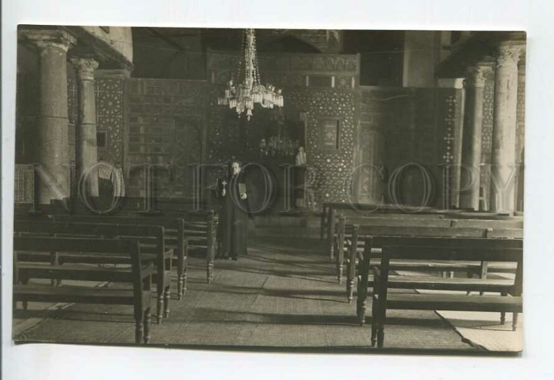 438783 UK interior of the church and the priest Vintage photo postcard