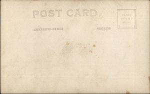 San Francisco CA Studio Man w/ Life Saving Ring & City Skyline c1930 RPPC