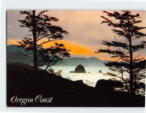 Postcard Oregon Coast Morning Mist on Haystack Rock at Cannon Beach Oregon USA