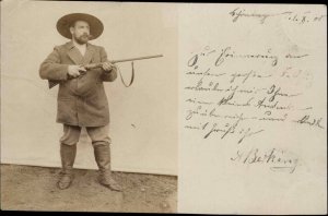 Man Poses w/ Gun Rifle SCHONINGEN GERMANY 1900 Real Photo Postcard