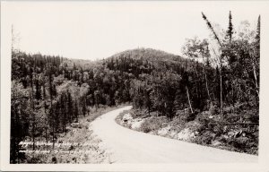 Nipigon Schreiber Highway near Schreiber Ontario Camera Shop RPPC Postcard H15