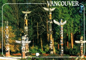 CONTINENTAL SIZE POSTCARD TOTEM POLES AT STANLEY PARK VANCOUVER BRITISH COLUMBIA