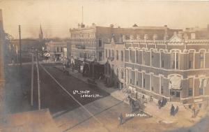 D37/ Lemars Iowa Ia Real Photo RPPC Postcard c1910 6th Street Bank Hotel Stores