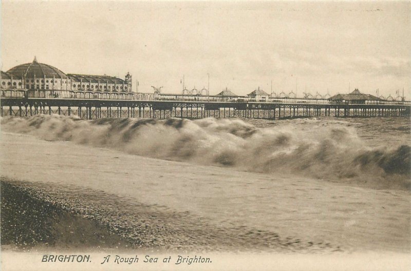 Postcard England Brighton  rough stormy sea near pier