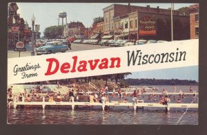 DELAVAN WISCONSIN DOWNTOWN MAIN STREET SCENE 1950s CARS VINTAGE POSTCARD