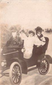 Vintage Postcard Woman in Dresses Bonnets & Driver Old Black Car Real Photo RPPC