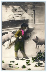 c1910's New Years Bonne Annee Little Boy Pigs Snow Winter RPPC Photo Postcard
