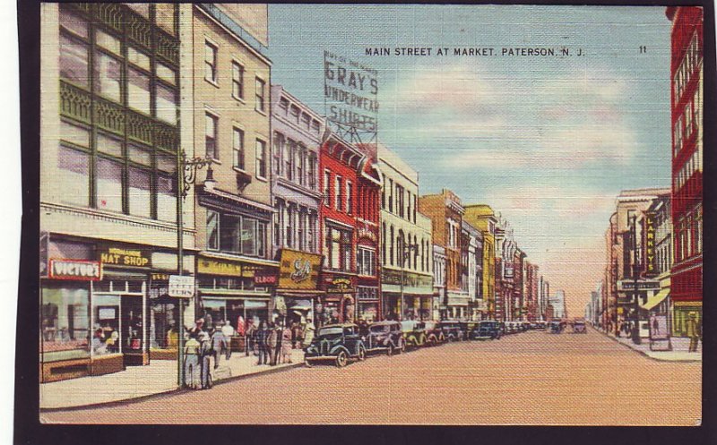 P1457 1940,s used postcard many old cars main st. at market paterson new jersey