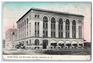 c1920's Jewett Drug & Wholesale Houses Dirt Road Aberdeen South Dakota Postcard