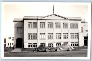 Alaska AK Postcard RPPC Photo High School Building Cars Scene Bicycle c1940's